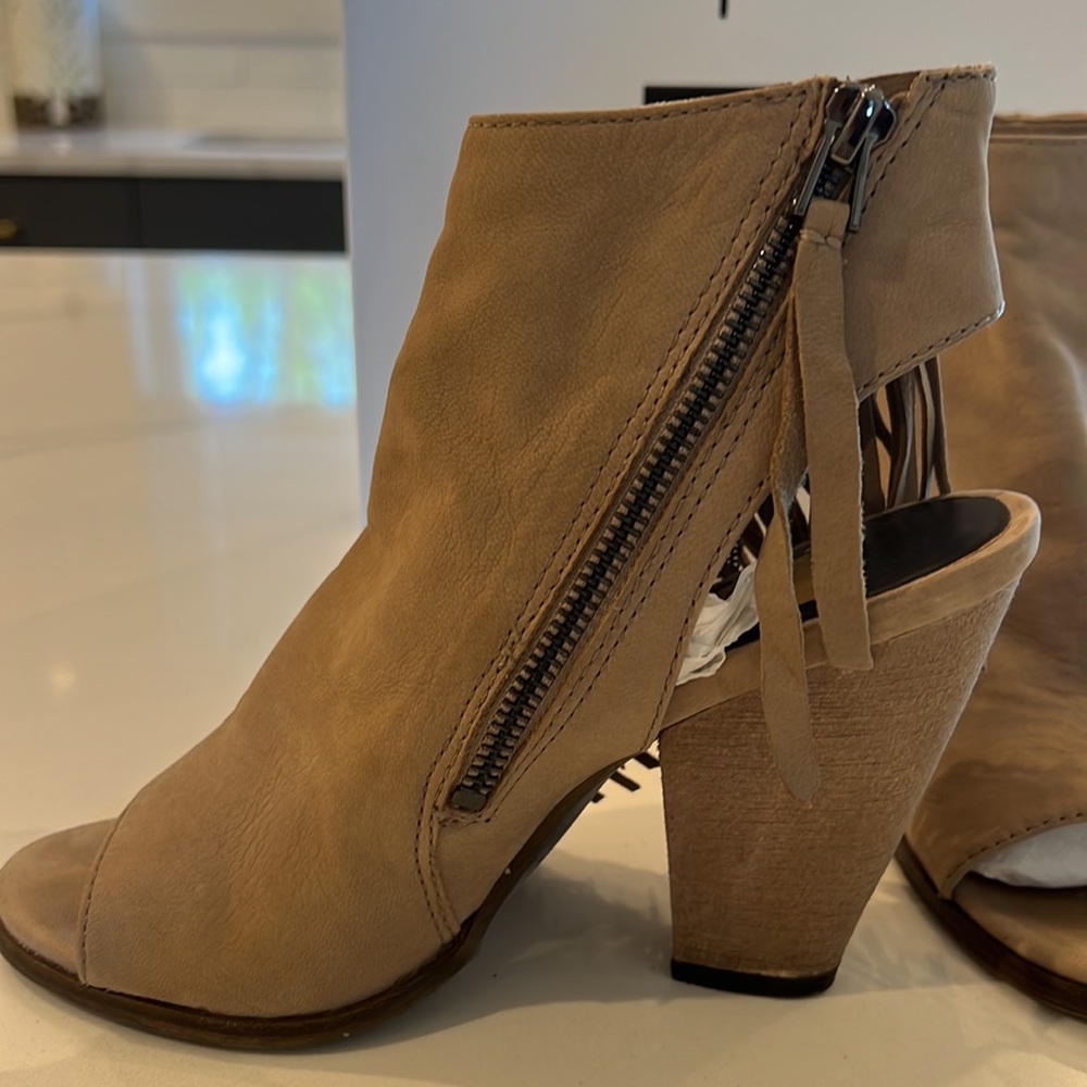 Dolce Vita open toe wedged heel.